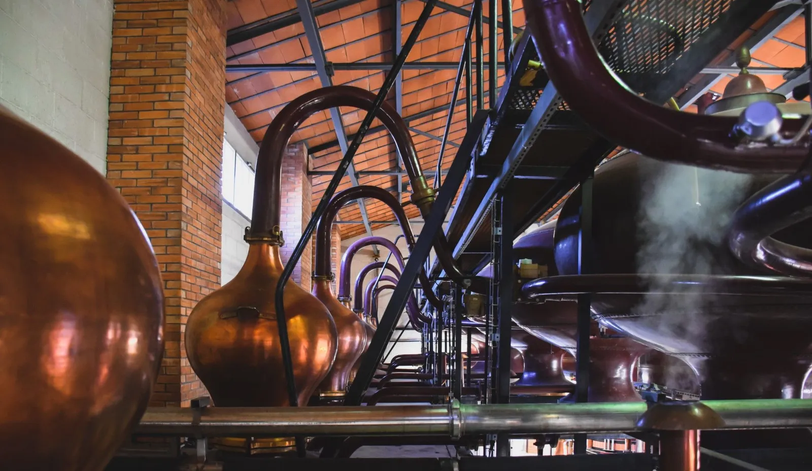 Copper pot stills in a distillery